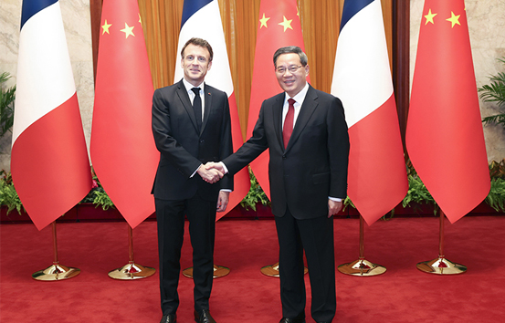 李强会见法国总统马克龙